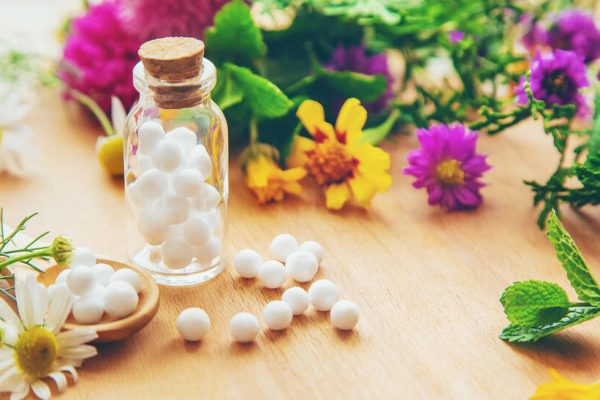 Homeopathy in small jars. Herbal extract. Selective focus. Homeopathy in small jars. Herbal extract. Selective focus. nature.